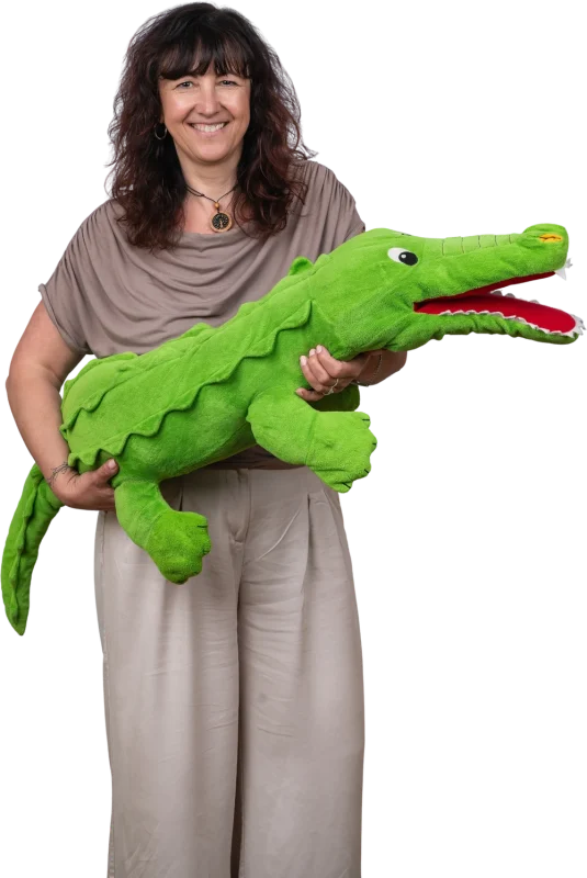 Pädagogische Fachkraft mit Spielfigur